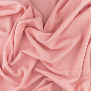 Stoff Milano Krepp aprikosenfarbener Strickstoff mit Steinchen 0,5m