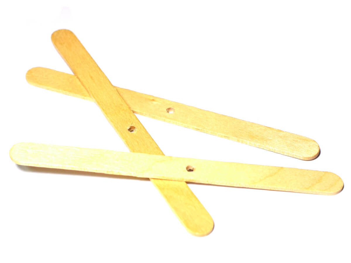 Holzstäbchen, Dochtständer